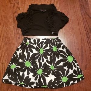 Girl size 7/8 black shell and black/green skirt